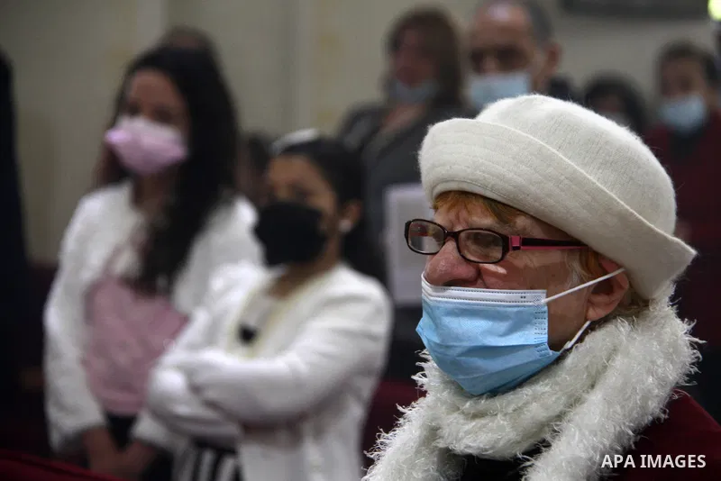 Palestinian Christians attend an Easter vigil mass, amid the coronavirus disease (COVID-19) outbreak at a church of Deir Latin, in Gaza City, on April 4, 2021. Easter Vigil, also called the Paschal Vigil or the Great Vig...