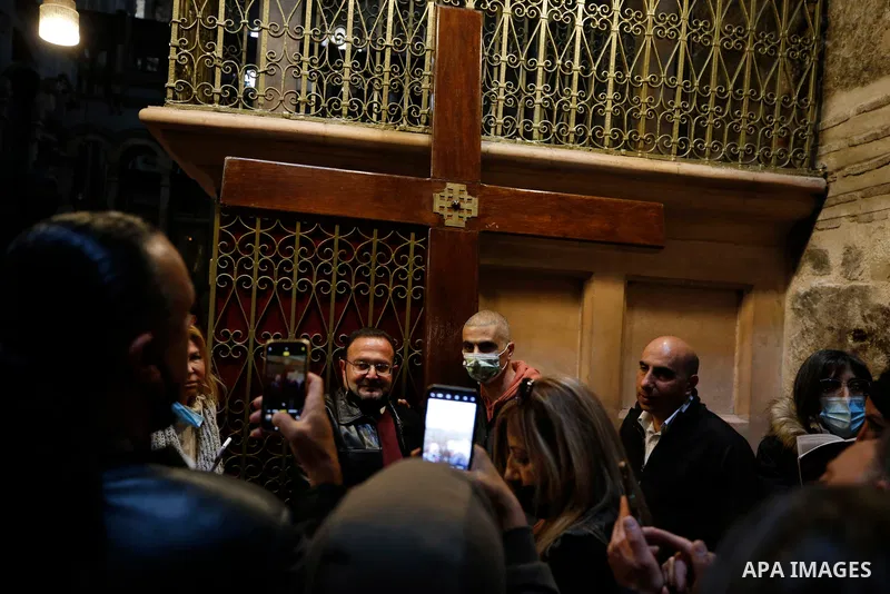 Christian worshippers take part in a Good Friday procession along the Via Dolorosa amid eased coronavirus disease (COVID-19) restrictions, during Easter Holy Week in Jerusalem's Old City April 2, 2021. Good Friday is the...