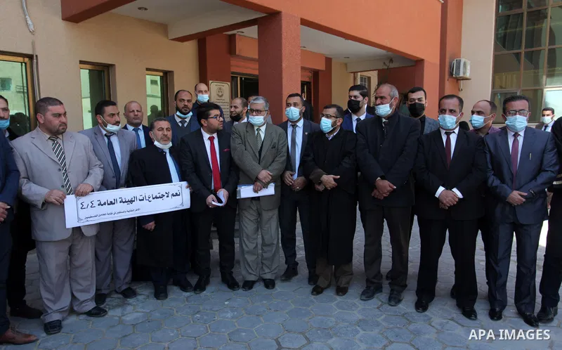Palestinians from the Bar Association attend a press conference on the occasion of Land Day, in front of the Bar Association headquarters in Gaza City, on April 1, 2021. Palestinians every year mark Land Day on March 30...