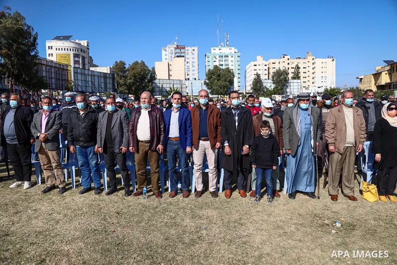 Palestinians attend a heritage festival of solidarity with employees 2005, whose salaries have been cut off, inside protest tent, in Gaza City on March 31, 2021. "The leaders agreed on the solutions for the outstanding i...