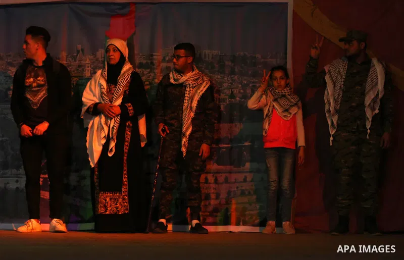 Palestinians perform during an operetta titled "Gharib ya Bladi" on the anniversary of the Battle of Dignity and International Theater Day in Gaza City on March 24, 2021. On the twenty first of March every year, Palestin...
