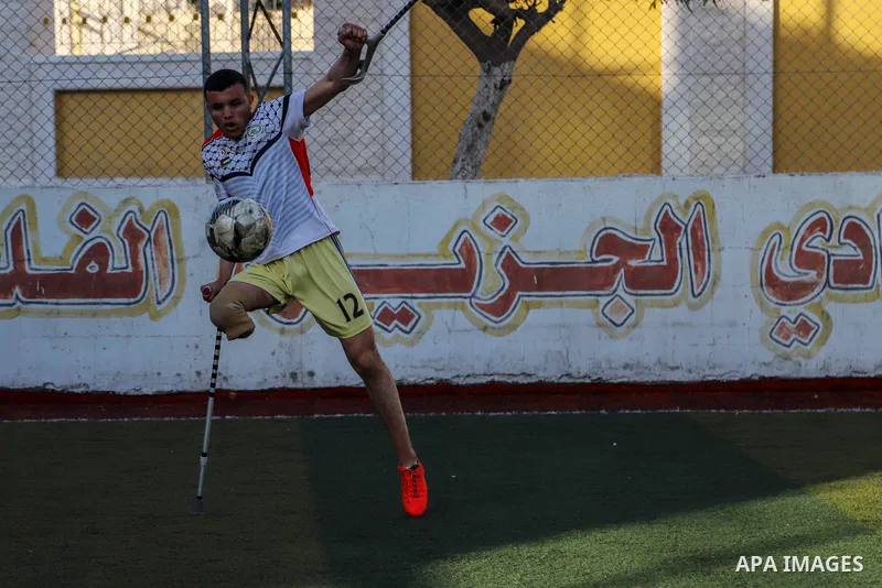 Disabled Palestinians who lost their legs by Israeli troops take part in the Football training on the Palestinian Wounded's Day, in Gaza city, on March 13, 2021. Al-Mezan Center for Human Rights said that more than (250,...