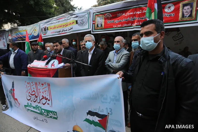 The General Secretary of the Palestinian National Initiative party Mustafa Barghouti, takes part in a portest on the Palestinian Wounded's Day, in Gaza city, on March 13, 2021. Al-Mezan Center for Human Rights said that...