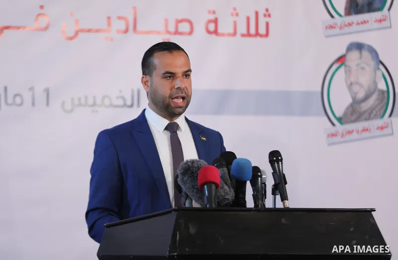 Eyad al-Bozm, the spokesman of the Palestinian Ministry of the Interior, speaks during a press conference, in Gaza city on March 11, 2021. The forensic report on the three fishermen found that they were killed by a sever...