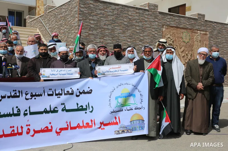 Members of the Palestine Scholars Association, take part in a protest in support for Al-Aqsa Mosque and Al-Quds, on the International Jerusalem Week, in Gaza city of March 10, 2021. Al-Aqsa Mosque compound, which include...