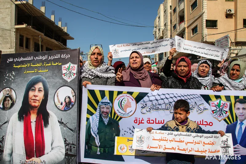 Palestinian women take part in a protest to solidarity with female prisoners in Israeli jails on the International Women's Day, in front of International Red Cross office in Gaza City, on March 8, 2021. Since the beginni...