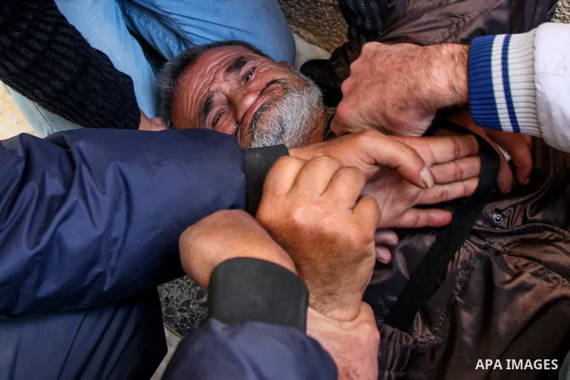 A Palestinian refugee reacts during a protest to demand their rights and provide job opportunities, in Gaza city, on March 7, 2021. Nearly one-third of the registered Palestine refugees, more than 1.5 million individuals...