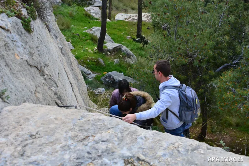 Team Rahal Palestine climb slopes on Wadi al-Qaf west of Hebron, on March 5, 2021. Wadi al-Qaf is a protected area of 4,600 dunums of the state’s land. The cultivated area is about 2,800 dunums, according to the estimate...