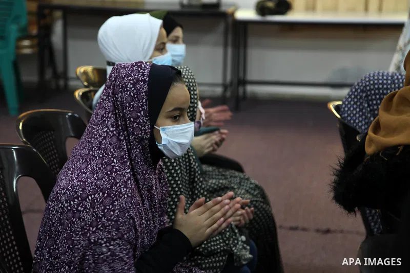Palestinian women attend a prophetic praise session, in a mosque in Gaza City on February 28, 2021. The "Love prophet brings us together" Band is the first female praise group in the Gaza Strip to perform praise sessions...