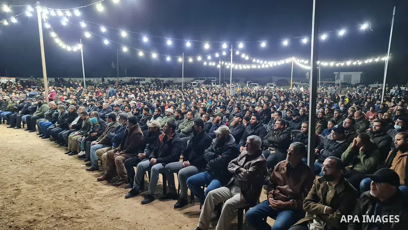 Palestinians attend a memorial service Mohammed Al Naem, who shot dead by Israeli forces, in Khan Yunis in the southern Gaza Strip on February 26, 2021. Al-Naem was killed shot dead by Israeli forces after he was suspect...