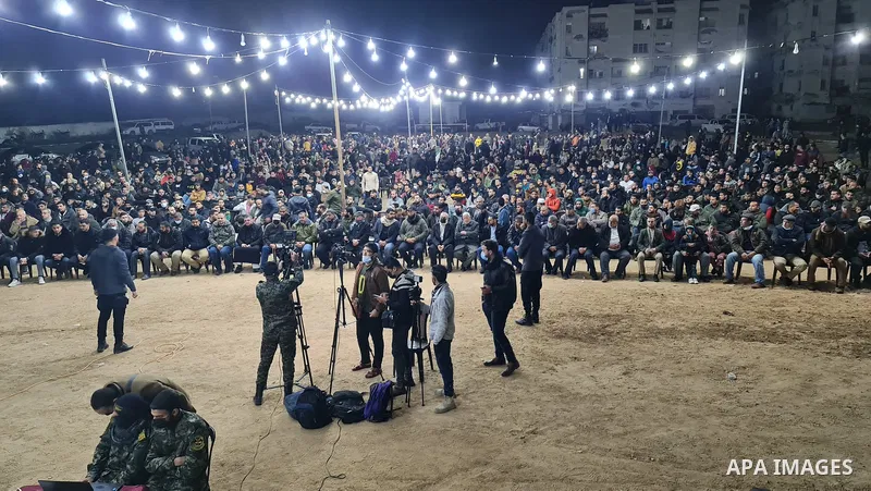 Palestinians attend a memorial service Mohammed Al Naem, who shot dead by Israeli forces, in Khan Yunis in the southern Gaza Strip on February 26, 2021. Al-Naem was killed shot dead by Israeli forces after he was suspect...