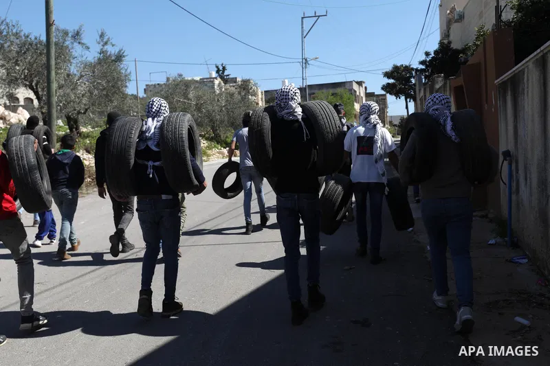 Palestinian protesters clash with Israeli security forces following a weekly demonstration against the expropriation of Palestinian land by Israel in the village of Kfar Qaddum, near the West Bank city of Nablus on Febru...