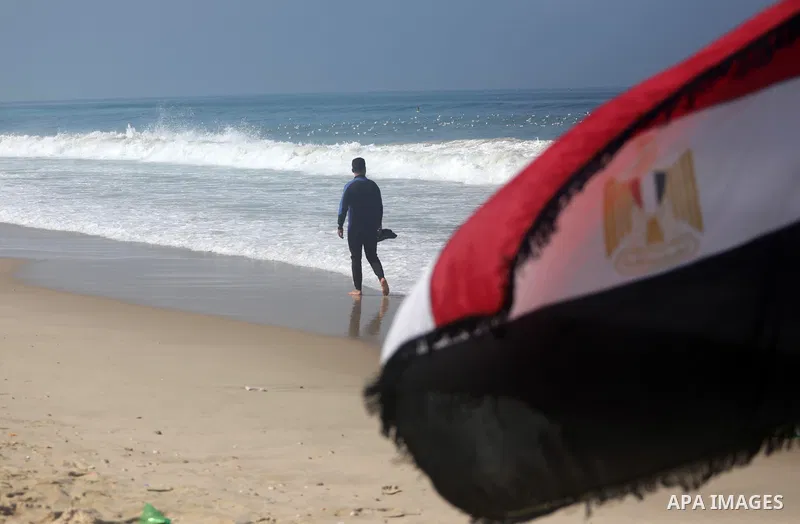Palestinian divers take part in a volunteer campaign to search for the missing Egyptian sailors, in the sea of Gaza City on February 26, 2021. The Ministry of Interior in the Gaza Strip said that it found a body that was...