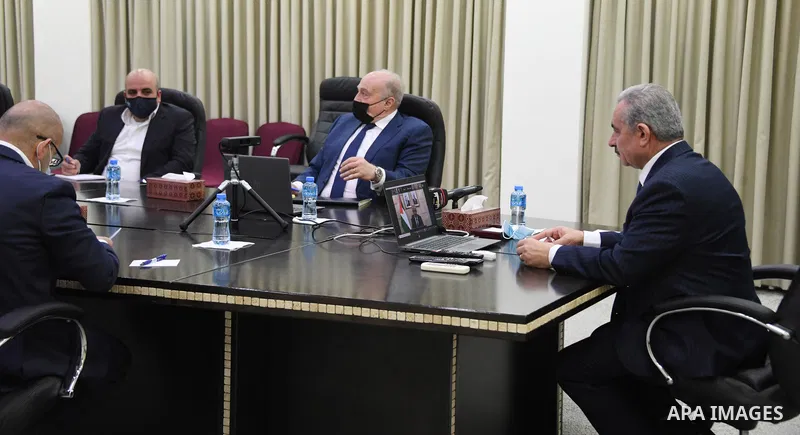 Palestinian Prime Minister Mohammad Ishtayeh, speaks during the AHLC donor nations meeting, in the West Bank city of Ramallah, on February 23, 2021. Photo by Prime Minister Office