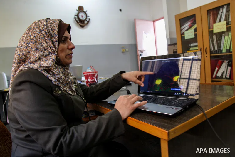 Palestinian teacher Lina Khalifeh, studies at Zahrat Al-Madaen School in Gaza City on February 22, 2021. The teacher Lina won the title of “Best Global Achievement for the Year 2021” from the EDUKOS UNITE Foundation in I...