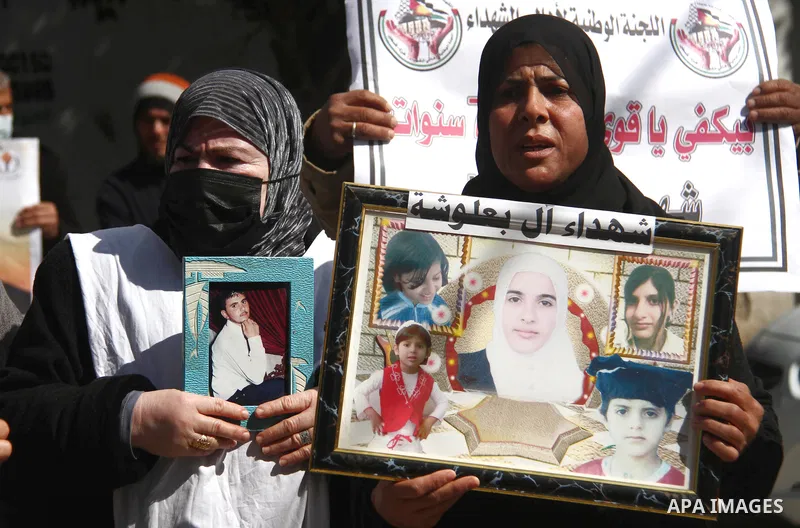 Families of Palestinian martyrs and wounded, take part in a protest against the Palestinian Authority's decision to cut their salaries for seven years, in Gaza city, on February 21, 2021. In January 2019, the PA cut the...