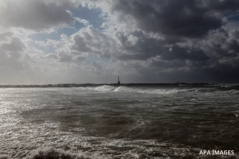 A general view shows the Gaza city during a stormy day, on February 17, 2021. The cloudy, stormy and very cold conditions are expected to continue on Thursday. Scattered torrential rain showers with thunderstorms and occ...