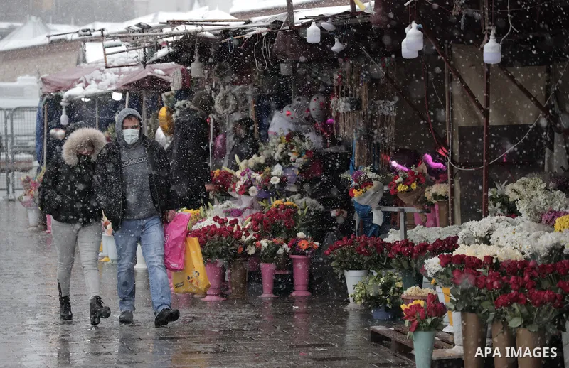 People enjoy during a snowy day in Istanbul, Turkey, on 15 February 2021. Temperature dropped to as low as two degrees Celsius on 15 February while the Turkish State Meteorological Service (TSMS) said Istanbul will witne...