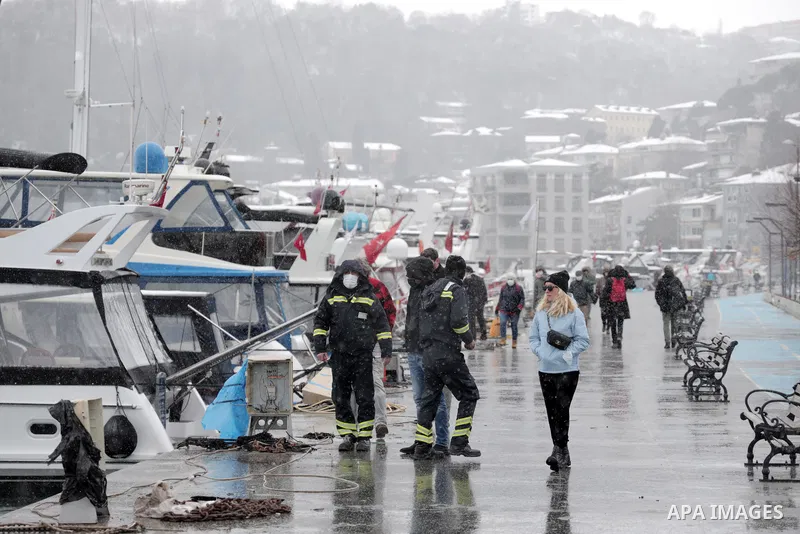 People enjoy during a snowy day in Istanbul, Turkey, on 15 February 2021. Temperature dropped to as low as two degrees Celsius on 15 February while the Turkish State Meteorological Service (TSMS) said Istanbul will witne...