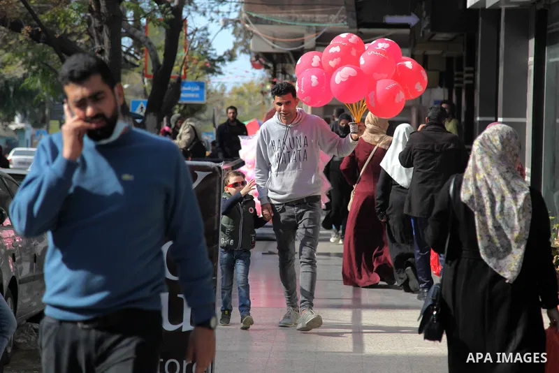 Palestinian vendors display flowers, red teddy bears, and pillows on Valentine's day, in Gaza city on February 14, 2021. Valentine's Day is increasingly popular in the region as people have taken up the custom of giving...