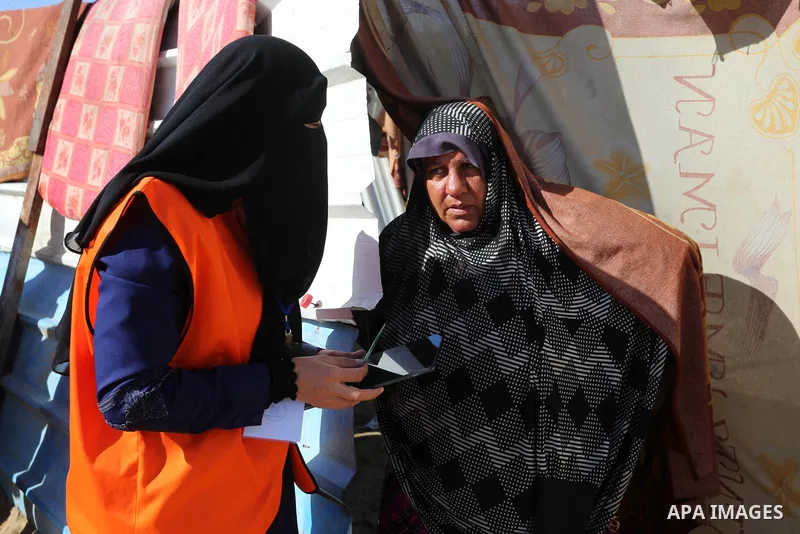 Palestinian members of Central Elections Commission register voters for the upcoming elections, at Nahr al-Bared refugee camp in Khan Younis in the southern Gaza Strip on February 11, 2021. Nahr Al-Bared is a marginalize...