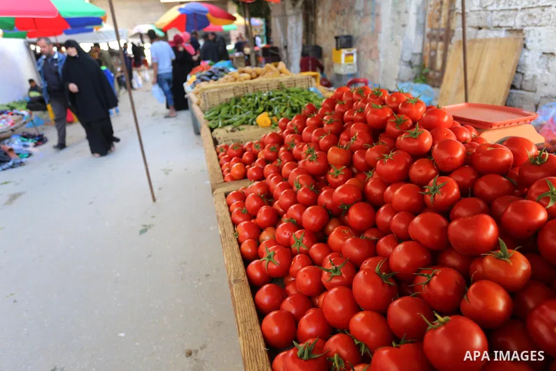 Palestinians shop at a popular market after lifting the state of closure, in Deir El-Balah, in the center of the Gaza Strip, on February 09, 2021. The Undersecretary of the Ministry of Local Government stated, "The decis...