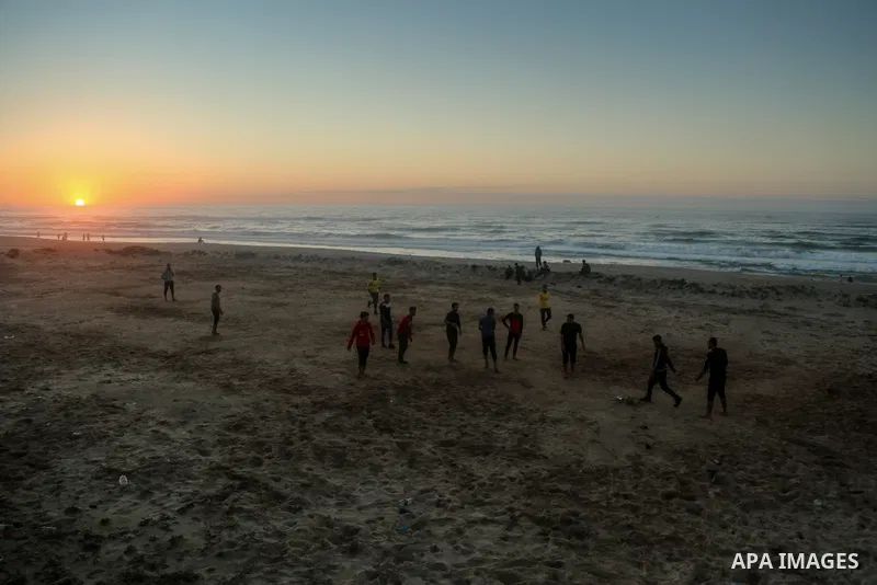 Palestinians enjoy their time on the beach, amid the outbreak of the coronavirus disease (COVID-19), in Gaza city on, on January 30, 2021. The Ministry of Interior announced a series of measures to alleviate the restrict...