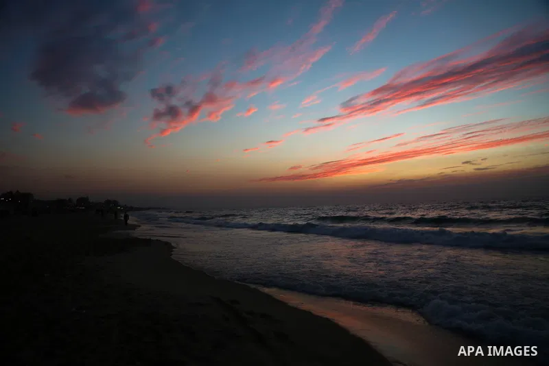 Palestinians enjoy their time on the beach, amid the outbreak of the coronavirus disease (COVID-19), in Gaza city on January 27, 2021. Photo by Mahmoud Alhende