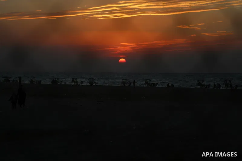 Palestinians enjoy their time on the beach, amid the outbreak of the coronavirus disease (COVID-19), in Gaza city on January 27, 2021. Photo by Mahmoud Alhende