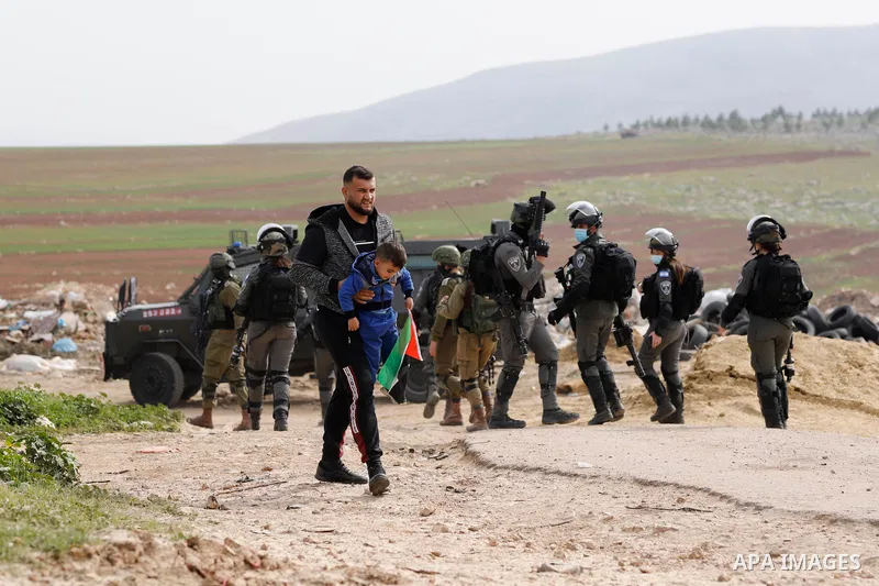 Palestinian protesters clash with members of Israeli border police near Tubas in the West Bank January 27, 2021. Today, Wednesday, the Israeli occupation forces uprooted hundreds of forest trees, with ages ranging betwee...