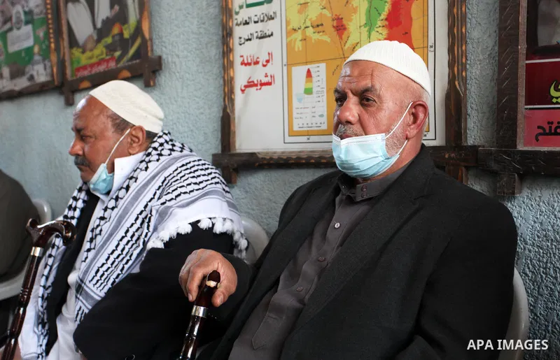 Palestinians take part in a protest in solidarity with the oldest prisoner Fuad Al-Shobaki, 82, A patient infected with Coronavirus in Israeli Jails, in Gaza City, on January 24, 2021. PPS said Israel's exclusive possess...