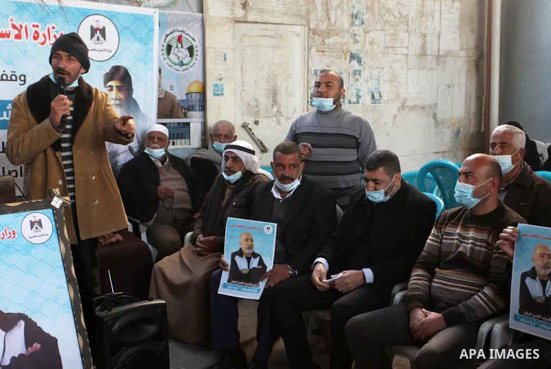 Palestinians take part in a protest in solidarity with the oldest prisoner Fuad Al-Shobaki, 82, A patient infected with Coronavirus in Israeli Jails, in Gaza City, on January 24, 2021. PPS said Israel's exclusive possess...