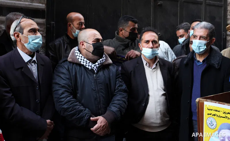 Palestinians take part in a protest in solidarity with the oldest prisoner Fuad Al-Shobaki, 82, A patient infected with Coronavirus in Israeli Jails, in Gaza City, on January 24, 2021. PPS said Israel's exclusive possess...