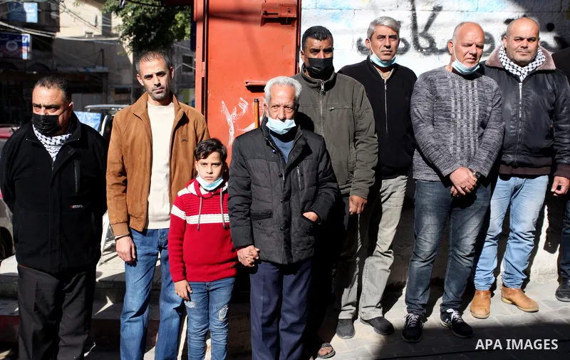 Palestinians take part in a protest in solidarity with the oldest prisoner Fuad Al-Shobaki, 82, A patient infected with Coronavirus in Israeli Jails, in Gaza City, on January 24, 2021. PPS said Israel's exclusive possess...