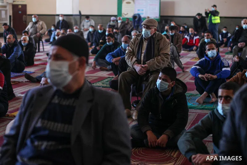 Palestinian Muslim worshipers attend Friday prayers in a mosque after the coronavirus disease (COVID-19) restrictions eased, in Gaza City January 22, 2021. Yesterday, the Ministry of Interior announced a series of measur...