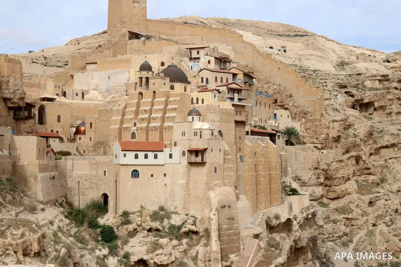 A picture shows the Greek Orthodox monastery of Saint Sabbas (Mar Saba), overlooking the Kidron valley, south of the West Bank city of Bethlehem, on January 17,2021. Is a Greek Orthodox monastery overlooking the Kidron V...