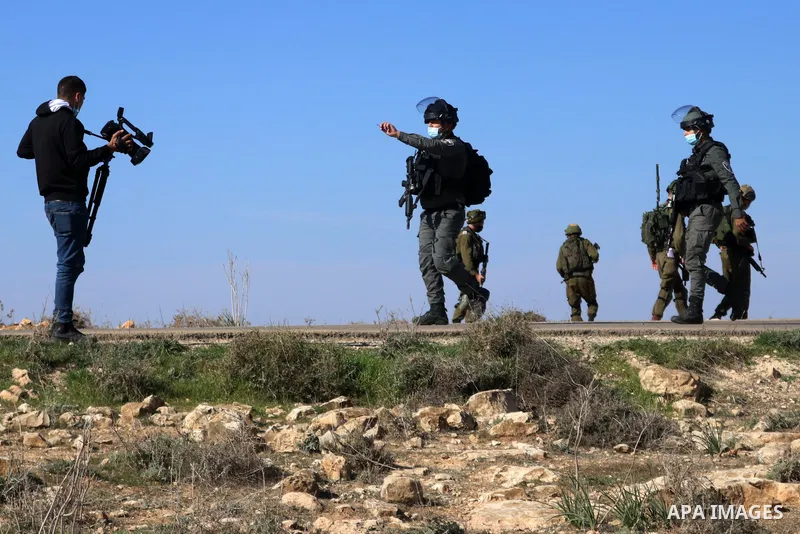 Palestinian protesters clash with Israeli forces during a protest against the Israeli army and settler attacks targeting the area’s Palestinian residents, in Yatta village in the southern West bank City of Hebron on Janu...