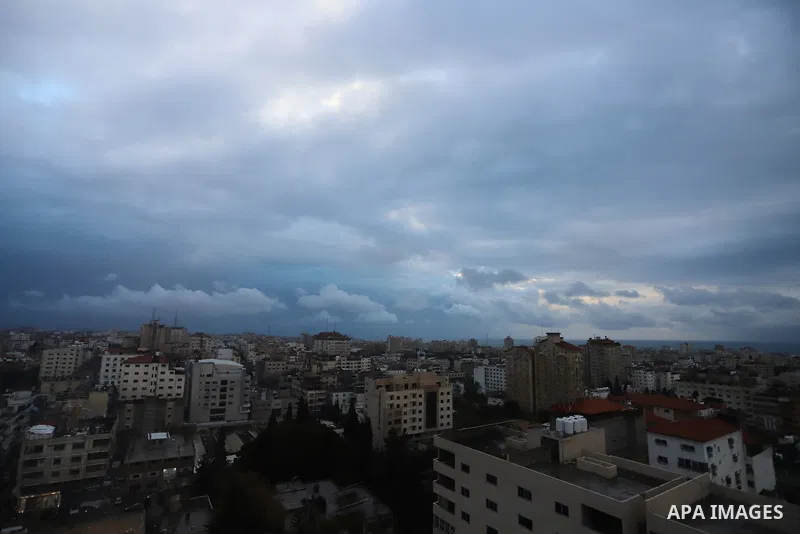 A general view of Gaza city during a rainy day, on January 15, 2022. ​The low pressure and polar front that affected Palestine yesterday is expected to continue today causing the temperature to plummet to 5°C below the s...
