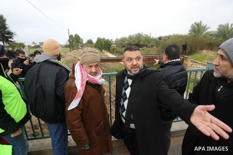 Members of Deir El-Balah Municipality in the center of Gaza strip inspect the roads during a heavy storm on January 27, 2022. Winter storm 'Elpis' hit the region bringing cold temperatures and snow. Photo by Ashraf Amra