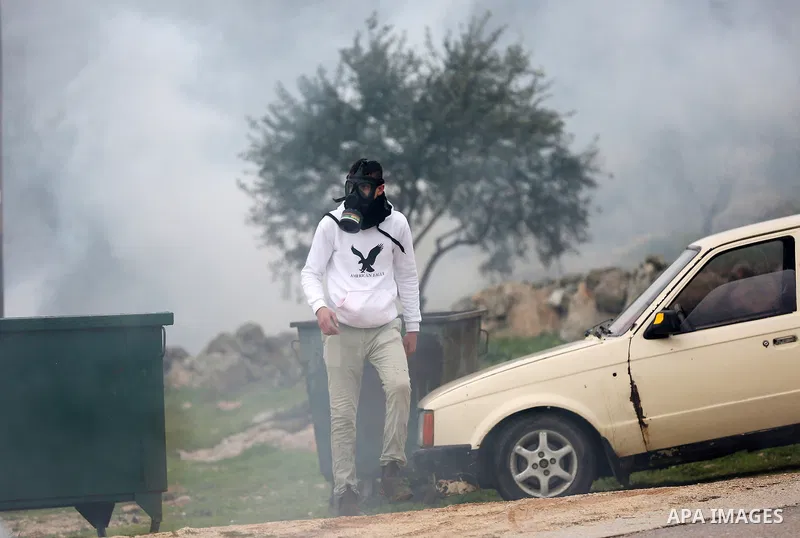 Palestinian protesters clash with Israeli security forces following a demonstration against settlements in the village of Beit Dajan in the West Bank, on January 28, 2022. Photo by Stringer