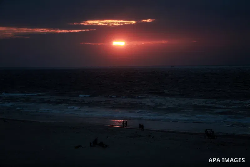 Palestinians enjoy on the beach of Gaza city on January 31, 2022. The beach is one of the few open public spaces in this densely populated city. Now a ceaseless conflict that seems to impinge on nearly every aspect of li...