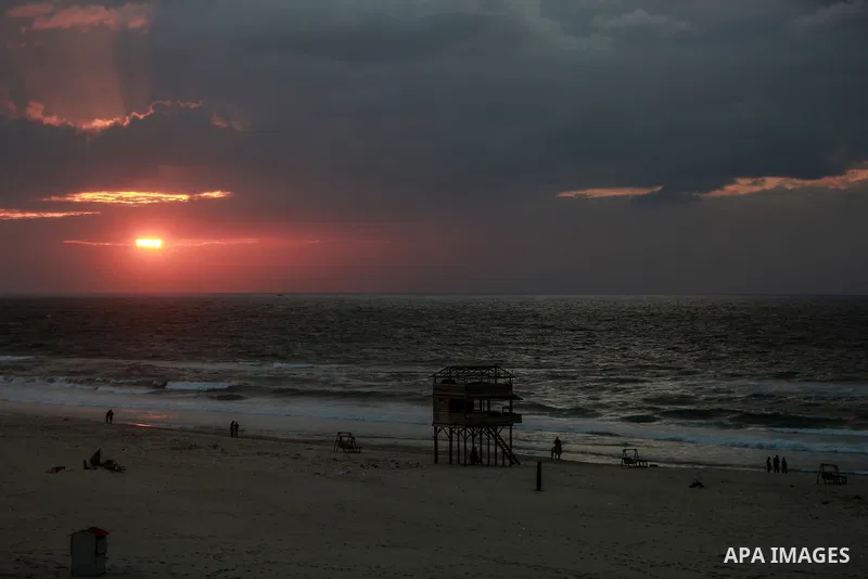 Palestinians enjoy on the beach of Gaza city on January 31, 2022. The beach is one of the few open public spaces in this densely populated city. Now a ceaseless conflict that seems to impinge on nearly every aspect of li...