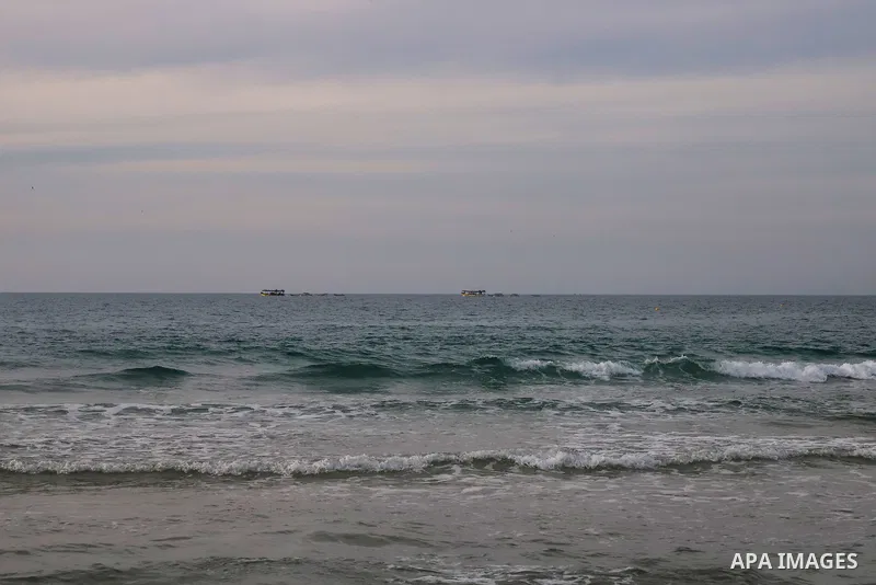 Palestinians enjoy on the beach of Gaza city during sunset on Feb. 02, 2022. The beach is one of the few open public spaces in this densely populated city. Now a ceaseless conflict that seems to impinge on nearly every a...