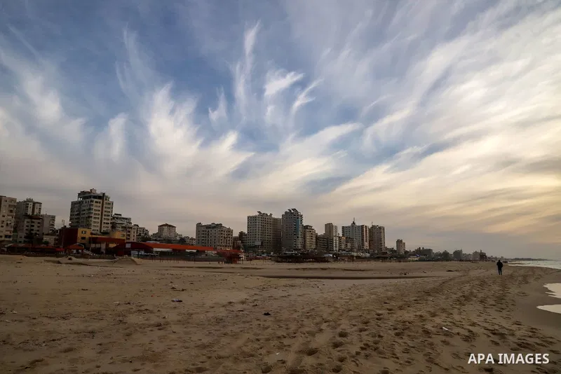 Palestinians enjoy on the beach of Gaza city during sunset on Feb. 02, 2022. The beach is one of the few open public spaces in this densely populated city. Now a ceaseless conflict that seems to impinge on nearly every a...