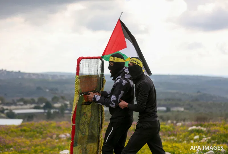 Palestinian protesters clash with Israeli security forces, following a demonstration against the expropriation of land by Israel in the village of Kfar Qaddum near the Jewish settlement of Kedumim in the West Bank on Feb...