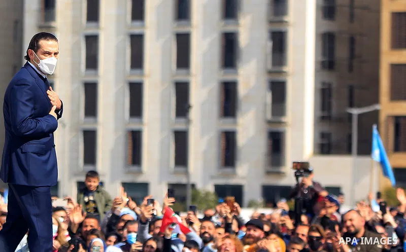 Lebanon's former premier Saad Hariri greets his supporters after visiting the gravesite of his father, slain prime minister Rafiq Hariri, in downtown Beirut on February 14, 2022, as Lebanon marked the 17th anniversary of...