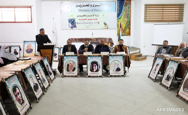 Palestinians attend a meeting against the Israeli policy of medical neglect of Palestinian prisoners in Gaza city on Feb. 16, 2022. Photo by Mahmoud Nasser