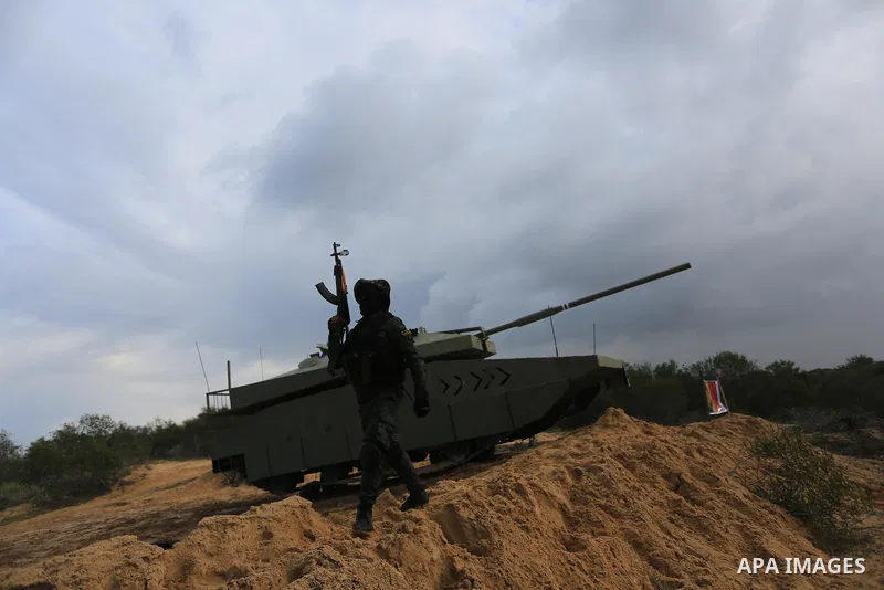 Members of al-Mujahideen brigades, the military wing of al-Mujahideen movement, take part in a military drill, in Rafah in the southern of Gaza strip, on February 19, 2022. Photo by Ashraf Amra