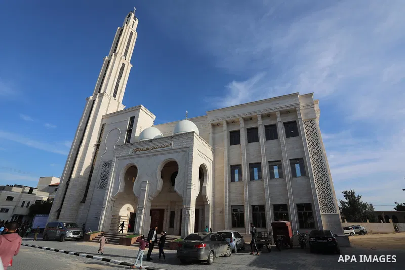Palestinians attend the opening ceremony of Grand Istaqlal Indonesia Mosque, in Khan Younis in the southern Gaza Strip on Feb. 22, 2022. Photo by Ashraf Amra