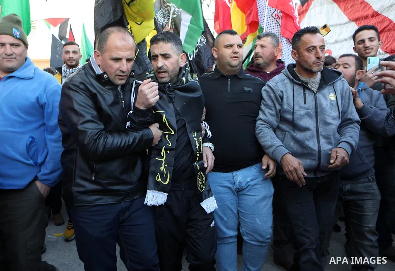 Hisham Abu Hawash a Palestinian prisoner who was on a hunger strike lasted 141 days, in an Israeli prison, is greeted by his relatives and friends upon his release, in the village of Dura, west the West Bank town of Hebr...